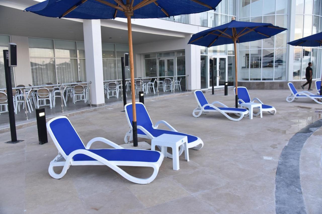 Golden Jewel Beach&Hotel Alexandria Exterior photo A rendering of a poolside scene created with Blender and Cycles