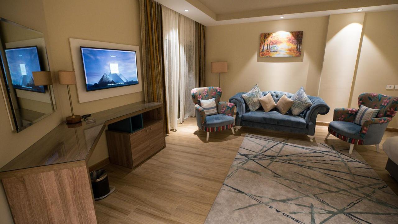 Golden Jewel Beach&Hotel Alexandria Exterior photo A living room in a hotel suite