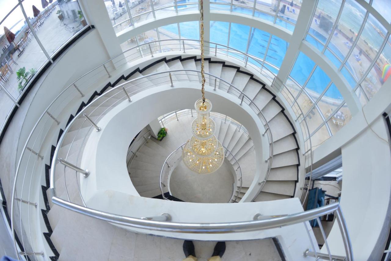Golden Jewel Beach&Hotel Alexandria Exterior photo Spiral staircase at the entrance of the building